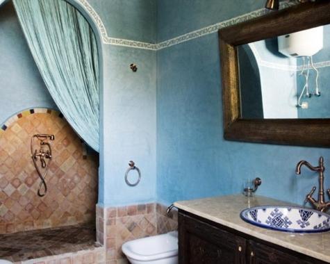 a bathroom with a sink and a toilet and a mirror at Le Riad Meknes in Mekn&egrave;s