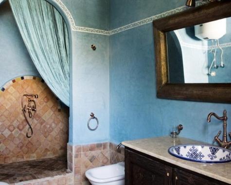 a bathroom with a sink and a toilet and a mirror at Le Riad Meknes in Meknès