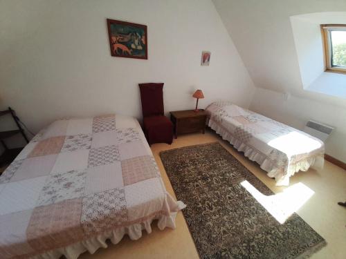 Postel nebo postele na pokoji v ubytování Gite à la ferme