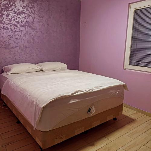 Ένα ή περισσότερα κρεβάτια σε δωμάτιο στο Sumska Vila Lisovic