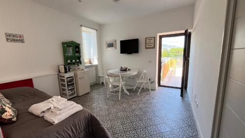 TV a/nebo společenská místnost v ubytování La casa di Nonna Rosa