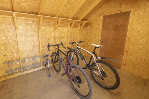 two bikes parked next to each other in a room at The Neuk in Kincraig