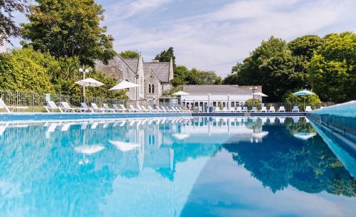 Πισίνα στο ή κοντά στο Cornwall family friendly villa with free use of Pool, soft play, mini golf, tennis, gym, fitness classes, sauna and ice baths