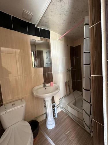 Een badkamer bij Кипарис