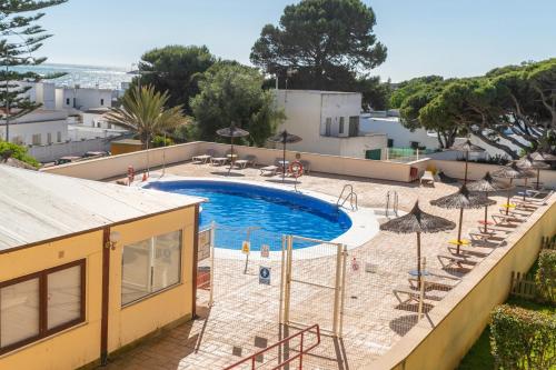 Bazén v ubytování Duplex Sereno 18 | Piscina, Garaje, Jardín y Playa nebo v jeho okolí