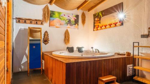a bathroom with a tub and a sink at Grand Paradise Resort Sapanca in Sapanca