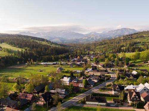 an aerial view of a small village in the mountains at Witowianka in Witów