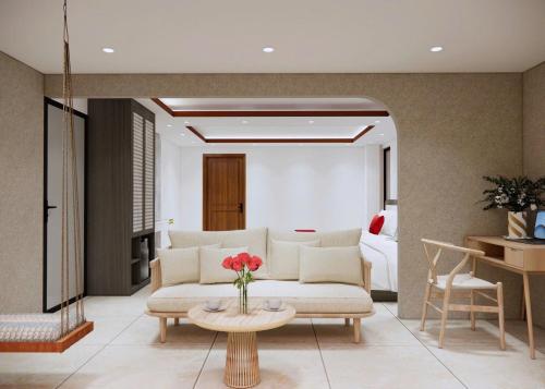 a living room with a couch and a table at Boutique En Hotel Sapa in Sa Pa