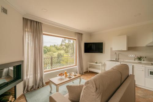 Μια τηλεόραση ή/και κέντρο ψυχαγωγίας στο Apartamentos Peñas Blancas