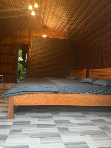 Postel nebo postele na pokoji v ubytování Mây's Garden Villa
