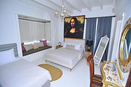 Кровать или кровати в номере B House Alaçatı