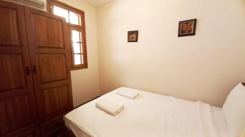 Katil atau katil-katil dalam bilik di Villa with sea views in Faralya