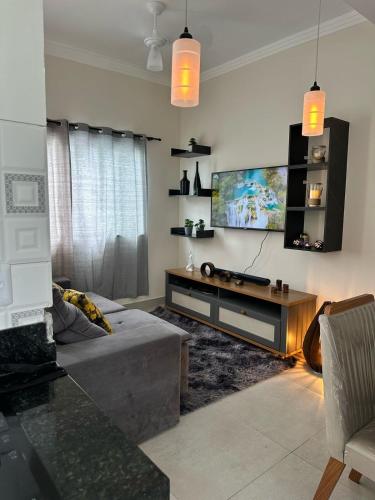 TV a/nebo společenská místnost v ubytování Casa e conforto com preço unico