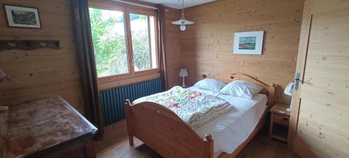 Postel nebo postele na pokoji v ubytování Le Chalet des Fées