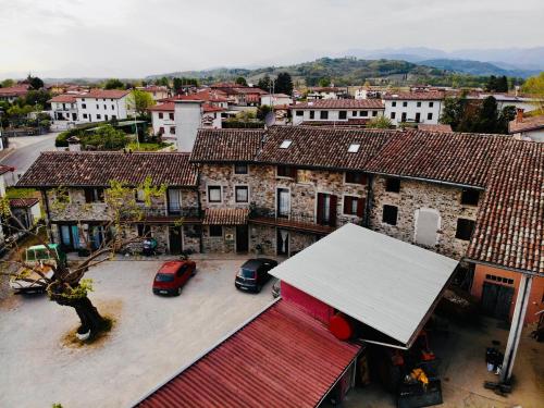 an overhead view of a town with buildings and cars at Agriturismo Clochiatti in Povoletto