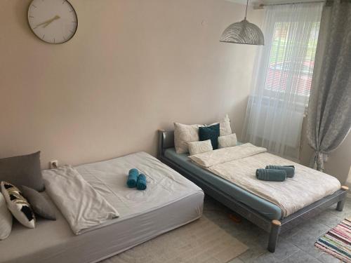 Postel nebo postele na pokoji v ubytování Apartmán u Hradu