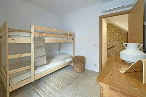 Postel nebo postele na pokoji v ubytování Luxury 8P town house in center lEscala 50m beach