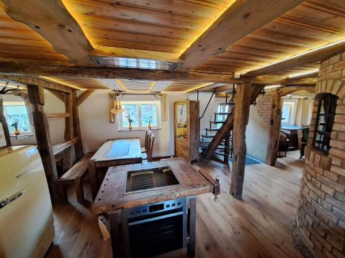 an interior view of a kitchen in a tiny house at Ferienhaus Rita in Bad Bocklet