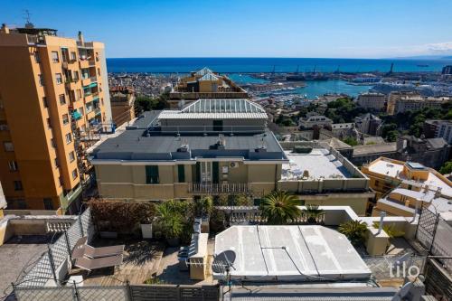 a view of the city from the top of a building at JACUZZI| TERRACE| 2BR| ART GALLERY| By Tilo Lux in Genova