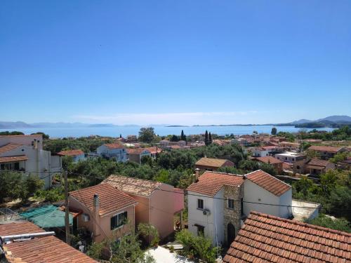 a view of a town from above at Olive Luxury Rooms in Ýpsos