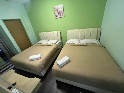 Ένα ή περισσότερα κρεβάτια σε δωμάτιο στο KISABEL Budget Hotel