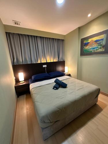 Postel nebo postele na pokoji v ubytování AJ's Regency Tanjung Tuan Beach Resort, Port Dickson, Malaysia - Seafront apartments