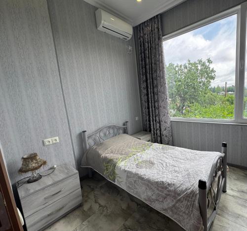 Postel nebo postele na pokoji v ubytování Hotel 9th Sky