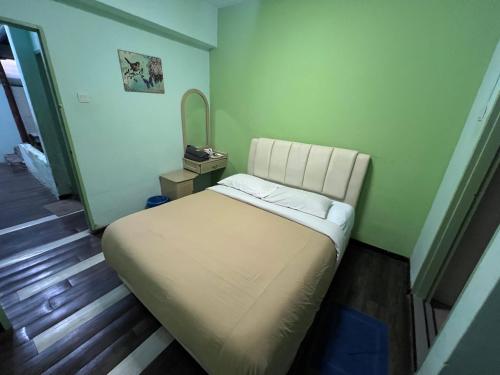 Ένα ή περισσότερα κρεβάτια σε δωμάτιο στο KISABEL Budget Hotel