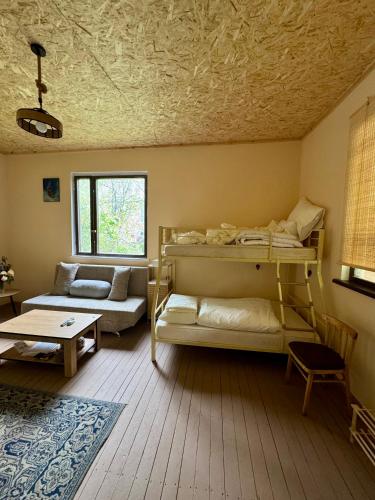Llit o llits en una habitació de Greenest 1977