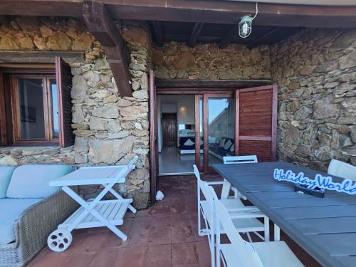Χώρος καθιστικού στο Villaggio Est by Holiday World