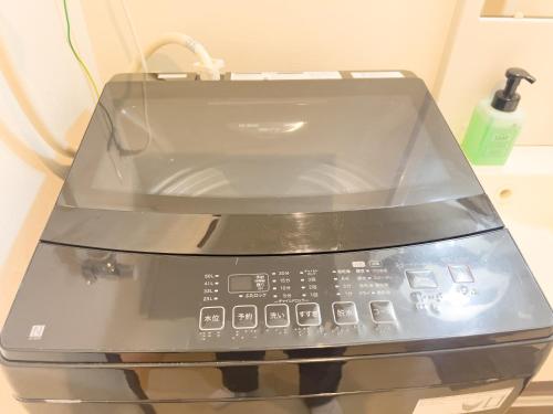 a close up of a toaster oven with a glass top at Prevoyance前原中央 in Itoshima
