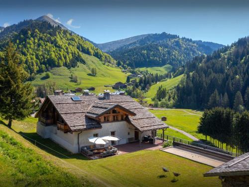 an aerial view of a house in a mountain at Chalet Goville - OVO Network in La Giettaz