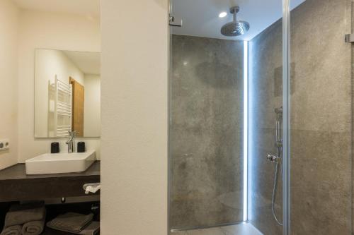 Koupelna v ubytování Dreimäderlhaus - Das vegetarische Boutique Hotel