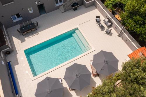 Bazén v ubytování Luxury Apartment Lorena - Private Heated Pool - nebo v jeho okolí