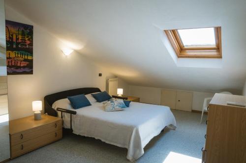 Postel nebo postele na pokoji v ubytování Double apartment 5 minutes from sea and private parking