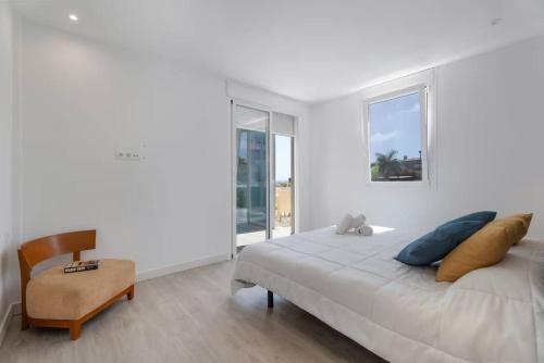 En eller flere senge i et værelse på Villa Lux Amarilla Golf