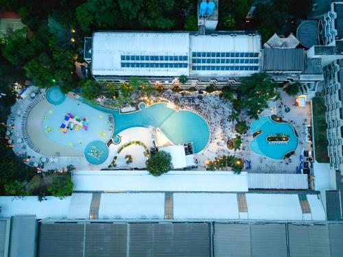 an aerial view of a pool at a resort at Rafain Palace Hotel & Convention Center in Foz do Iguaçu