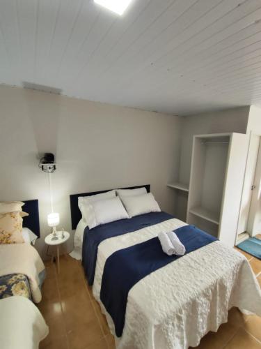 a bedroom with two beds in a room at Loft 672 in Petrolina