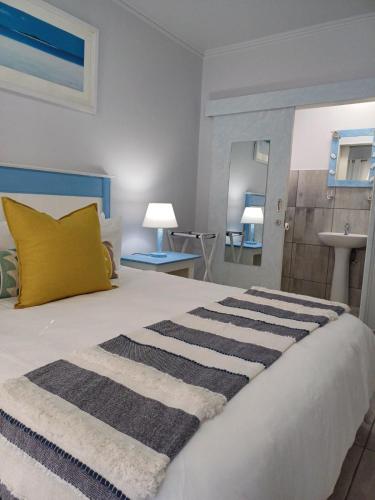 En eller flere senge i et værelse på Portobelo 6