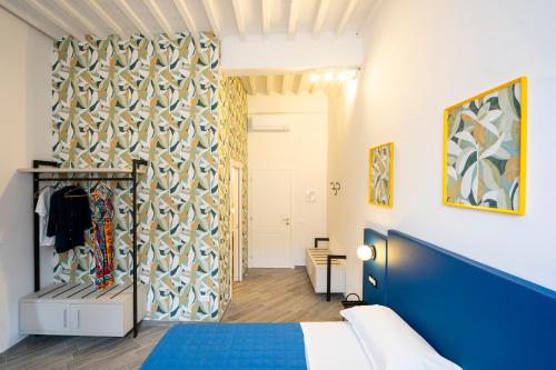 Postel nebo postele na pokoji v ubytování B&B Via Corsica 10