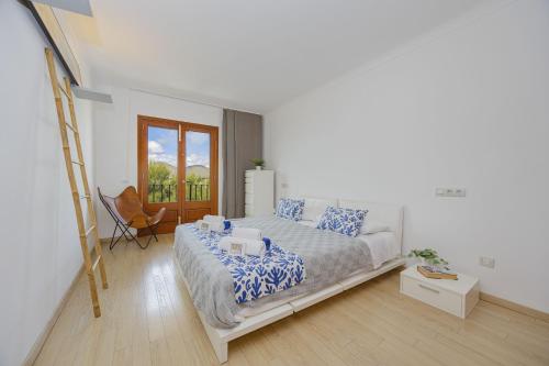 Postel nebo postele na pokoji v ubytování Apartamento Ciutadella 1