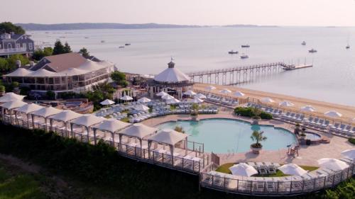 an aerial view of a resort with a pool and a pier at Wequassett Resort and Golf Club in East Harwich