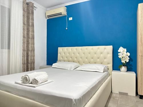 Postel nebo postele na pokoji v ubytování Bluva rooms