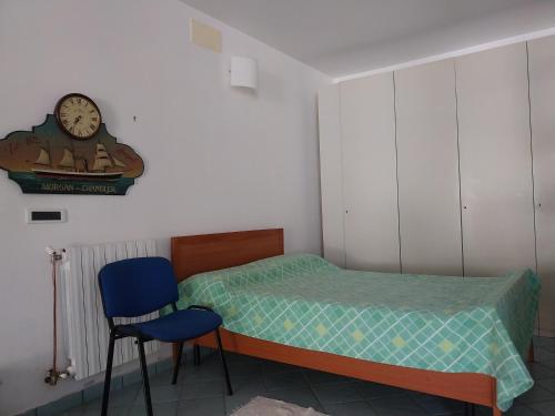 Ένα ή περισσότερα κρεβάτια σε δωμάτιο στο Appartamento 100mq in villa con giardino recintato