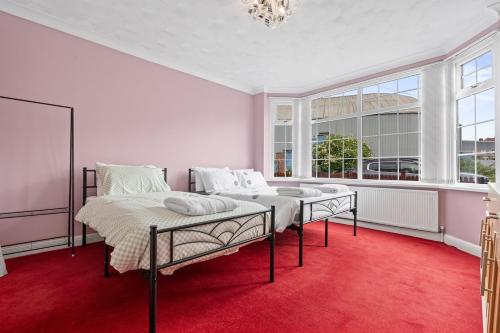 Ένα ή περισσότερα κρεβάτια σε δωμάτιο στο Awesome 4-Bedroom Serviced Apartment