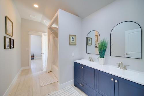 a bathroom with a sink and a mirror at Hike, Fish and Explore Cabin Near Eufala Lake! in Crowder