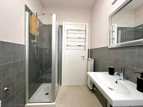 a bathroom with a shower and a sink at Casa Vivì in Porto SantʼElpidio