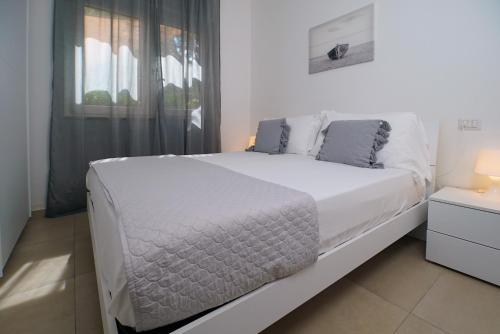 Ένα ή περισσότερα κρεβάτια σε δωμάτιο στο Casa Vacanze Palinuro-Mare
