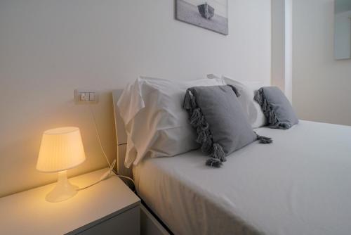 Ένα ή περισσότερα κρεβάτια σε δωμάτιο στο Casa Vacanze Palinuro-Mare