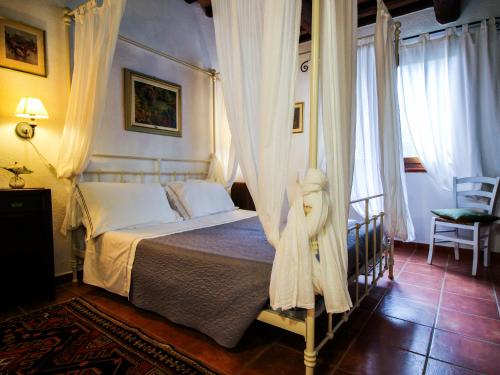 Katil atau katil-katil dalam bilik di Agriturismo Boschi di Montecalvi